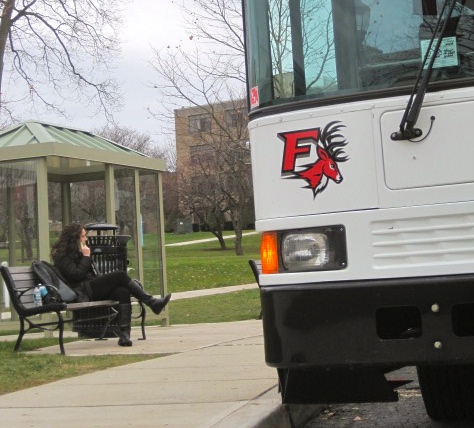 A student waiting at the BCC bus stop